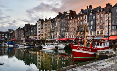 A city with many boats docked at the water