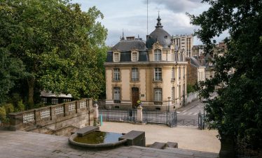 Elegant 19th-century building with garden in the heart of Rennes, France, showcasing classic architecture.